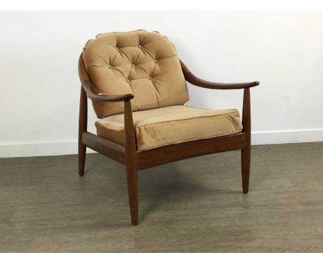 GREAVES & THOMAS OF LONDON, TEAK ARMCHAIR, CIRCA 1960-69 with swept arms and raised on tapered supports, the button-back back