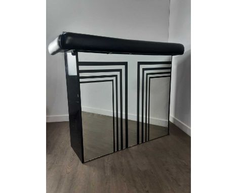 ART DECO STYLE HOME BAR, CONTEMPORARY with mirrored front, black leatherette bolster cushion to top, the reverse fitted with 