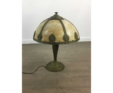 ART NOUVEAU SLAG GLASS TABLE LAMP, EARLY TO MID-20TH CENTURY the domed slag shade with brass plated frame, over tapered suppo