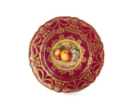 FRANK HIGGINS FOR ROYAL WORCESTER, CIRCULAR PLATE, painted with apples and grapes within a deep red and gilded border, signed