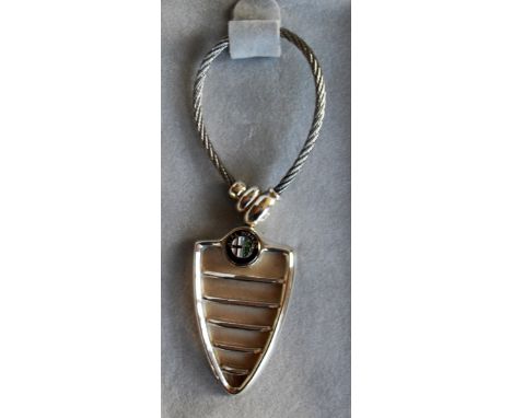 Four silver key rings to include a .925 Alfa Romeo key ring in original case (4)
