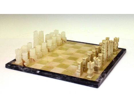 Onyx chessboard with Aztec-style chess pieces, the board 35cm x 34cm 