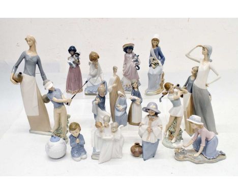 Large quantity of Nao and Lladro porcelain figures to include; girl holding a doll (5608), maids, golfers, choir of angels, e