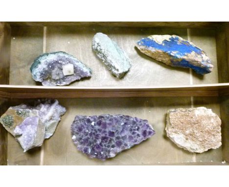 Collection of six mineral specimens, comprising three amethyst boulders and three others (possibly including pyrite and turqu