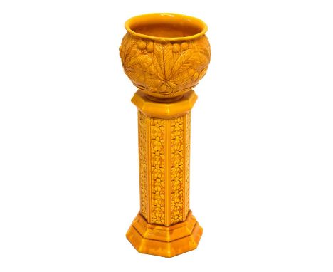 Burmantofts orange glazed faience jardinière on octagonal stand, the jardinière with impressed mark and '2125S', the stand wi