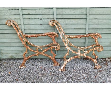 Pair of white painted cast iron bench ends