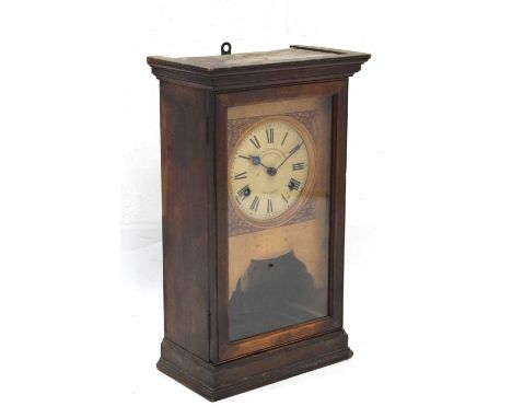 National Time Recorder Company glazed door wall clock, gilt dial with black Roman hour markers, 39cm x 22.5cm x 65cm high, wi