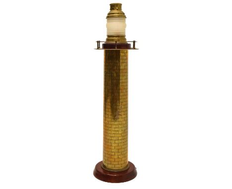 Large brass floor standing lamp in the form of a lighthouse, on circular wooden base, 89cm high