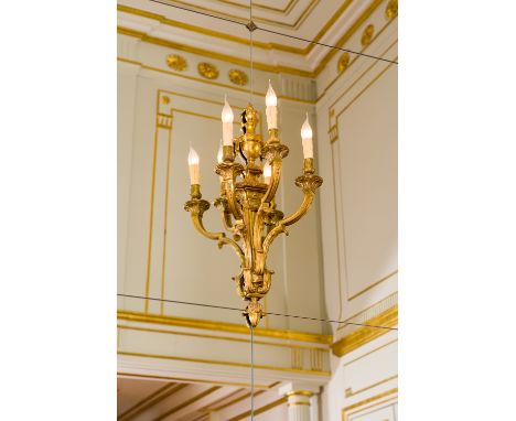A pair of French gilt bronze Louis XVI style three-light wall appliques, 19th C.H 75 - L 31 cm
