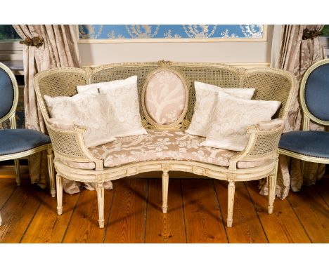 A French patinated wooden Louis XVI style cannage sofa, 19th C.H 93 - L 162 - D 75 cm