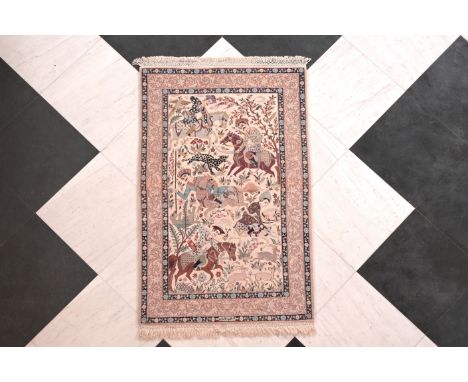 A Persian Isfahan rug with hunting scenes, wool and silk on cotton, signed Ghafarian, 20th C.171,5 x 111 cm