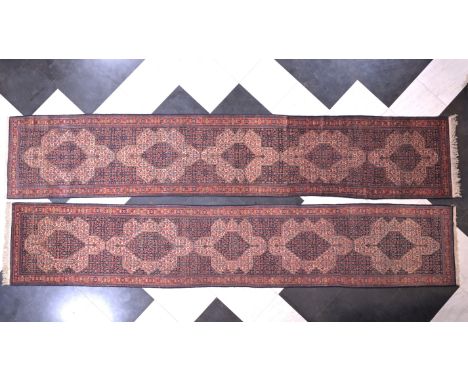 A pair of Persian Senneh runners with floral design, wool on cotton, first half 20th C.593,5 x 111 cm  587 x 108 cm