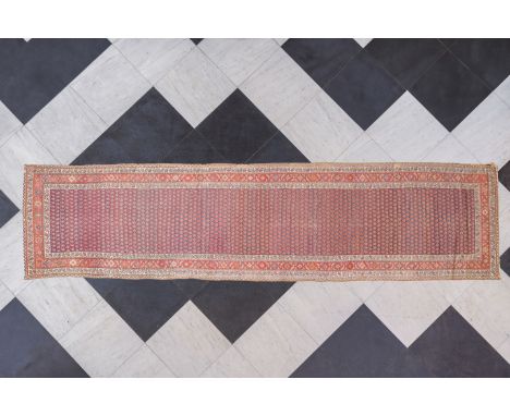 A Persian Malayer runner with floral design, wool on cotton, first half 20th C.477 x 118 cm