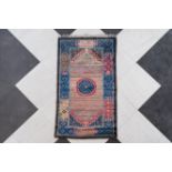 A Chinese Pao Tao rug with geometric design, 20th C.