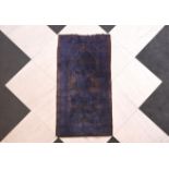 A Chinese Pao Tao rug with floral design, 20th C.