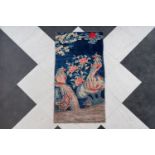 A Chinese Pao Tao carpet with two phoenixes, 20th C.