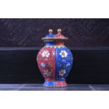 A Chinese conjoined two-part famille rose sgraffito ground vase with floral design, Qianlong mark, Q