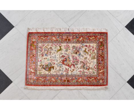 A Persian Qom (Qum/Ghom) silk rug with a hunting scene, 20th C.117,5 x 78,5 cm