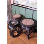 Three Chinese carved wooden, marble and lacquer stands, 20th C.