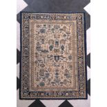 A Chinese-Mongolian rug with stylized motifs, wool on cotton, ca. 1900