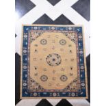 A Chinese rug with floral design, wool on cotton, 20th C.