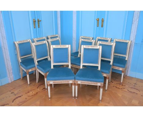 Twelve French gilt and patinated wooden Empire chairs with blue velvet upholstery, first quarter 19th C.H 93 - L 49 - D 54 cm