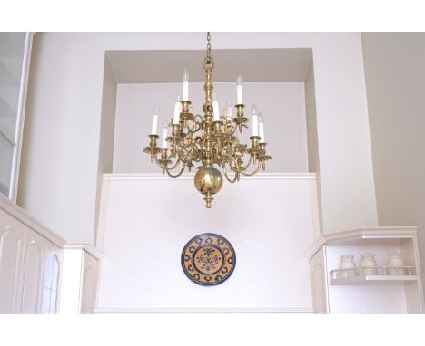 A Renaissance style brass twelve-light 'ball' chandelier, 19th/20th C.H 90 cm - Dia.: 74 cm