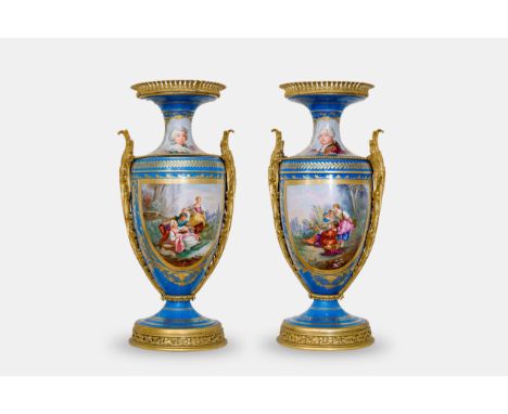 A pair of French gilt bronze mounted gold layered turquoise ground Sevres style vases with royal portraits, ca. 1890H 70 cm  