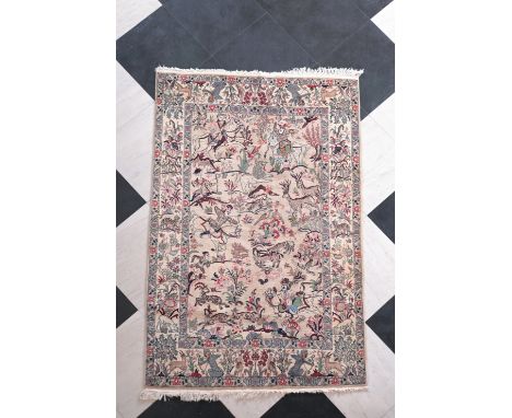 An oriental Persian style rug with hunting scenes, wool on cotton, possibly Pakistan, 20th C.241 x 156,5 cm