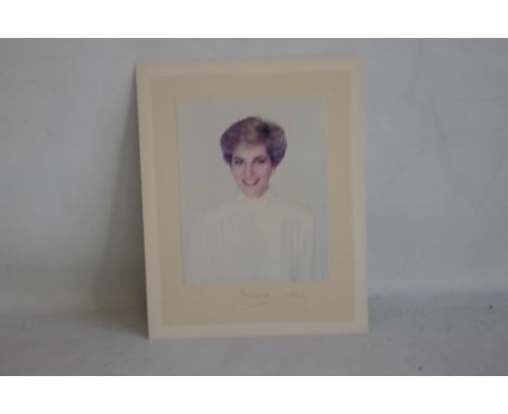 PRINCESS DIANA, PORTRAIT PHOTOGRAPH ON BOARD SIGNED BELOW "DIANA 1988", the photograph showing Diana in a white blouse, photo