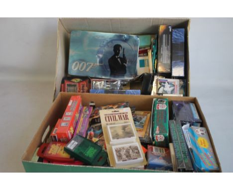 TWO TRAYS CONTAINING A LARGE COLLECTION OF VARIOUS BOXED / UNOPENED PLAYING CARDS, trade cards, gaming cards, Top Trumps etc.