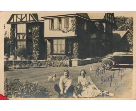 George and Beryl Formby Signed 6x4 inch Black and White Vintage Photograph. Image shows the pair outside their house. Signed 