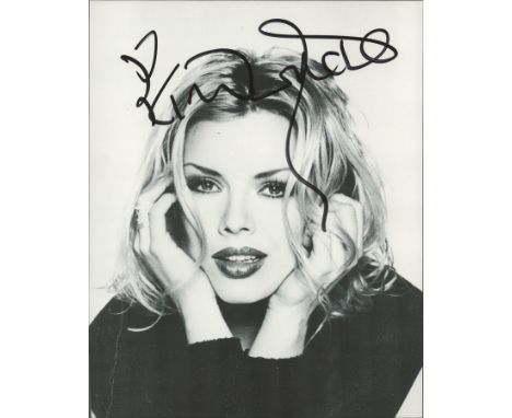 Kim Wilde signed 10x8 black and white photo. Kim Wilde (born Kim Smith, 18 November 1960) is an English pop singer, DJ and te