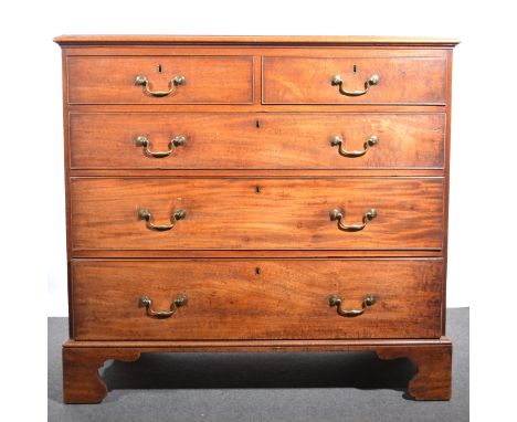 A Georgian mahogany chest of drawers, rectangular top with moulded edge, above two short and three long drawers, bracket feet