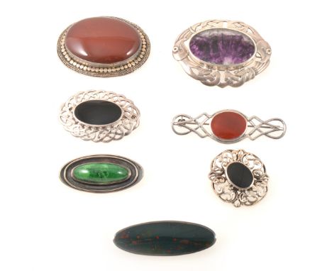 Seven silver and white metal stone set brooches, a large cornelion brooch, 50mm x 40mm, hallmarked Birmingham import mark for