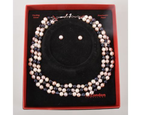 88 London Jewellery - a three strand black and white freshwater pearl necklace, 45cm long, average size of pearls 8mm, fitted