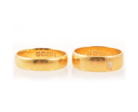 Two 22 carat yellow gold wedding rings, both plain polished finish, one 6.2mm wide half D shape, Birmingham 1909, makers mark