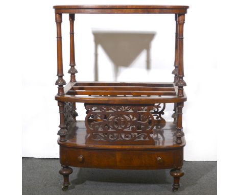 A Victorian walnut burr walnut Canterbury, bowfront throughout with boxwood and ebony stringing, top shelf supported by turne