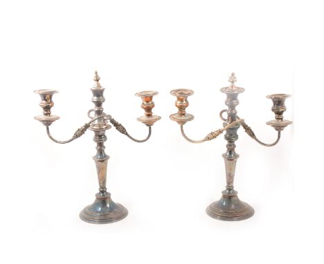 A pair of electroplated three-light candelabra, 43cm high.
