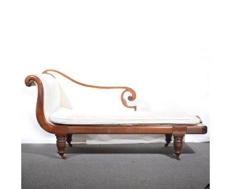 A Victorian mahogany chaise longue, scrolled end and back, loose cushion, turned legs, on castors, length 165cm, depth 65cm, 