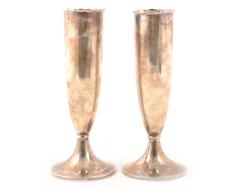 A pair of silver bud vases by Harrison Brothers &amp; Howson (George Howson), Sheffield 1907, plain polished tubular design w