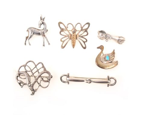A Danish silver bridle bit brooch by Willy H Jacob Krogmar, marked Sterling, 65mm, an early David Anderson 40mm folk brooch m