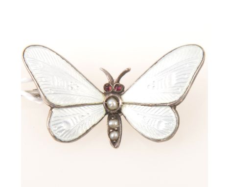 A vintage white enamel butterfly brooch set with three seed pearls and red eyes, marked Sterling silver on back, 30mm.