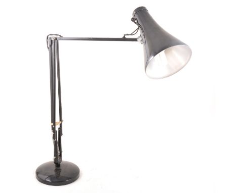 A vintage black Anglepoise lamp.