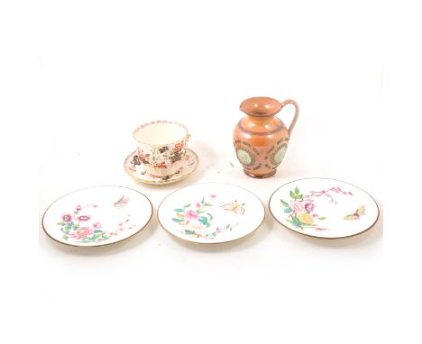 Royal Worcester decorative plates, each with different flower and butterfly, 1881-1882; a Doulton Lambeth stoneware motto jug