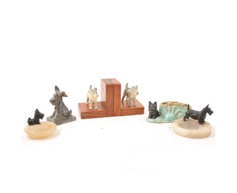 Scottie Dog related collectables, a pair of book ends with lead dogs, onyx ashtrays, black ceramic money box, vase, metal tri