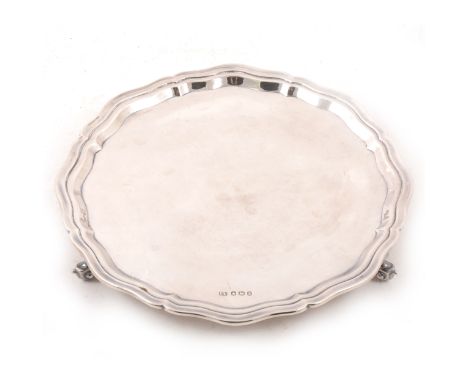 A circular silver salver by Viner's Ltd (Emile Viner), Sheffield 1961, marked on underside "Sterling Made in England" plain p