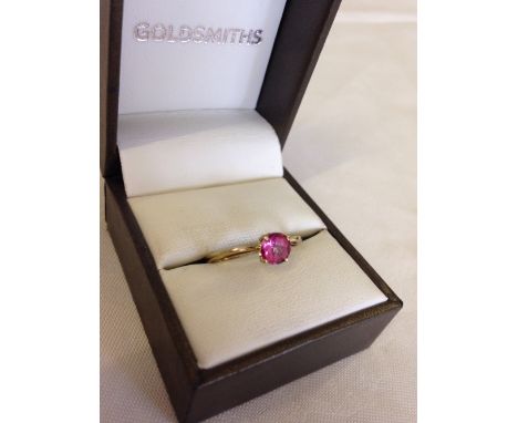 9ct gold ladies dress ring set with a 7.5ct pink Tourmaline Size approx N.  