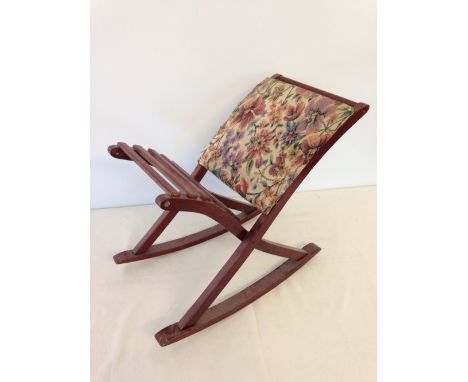A modern upholstered foot/gout stool.  