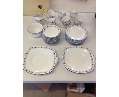 A Reid & Co Roslyn China c1920's 12 piece tea service comprising :- milk jug, sugar bowl, 12 tea cups, 12 saucers, 12 tea pla